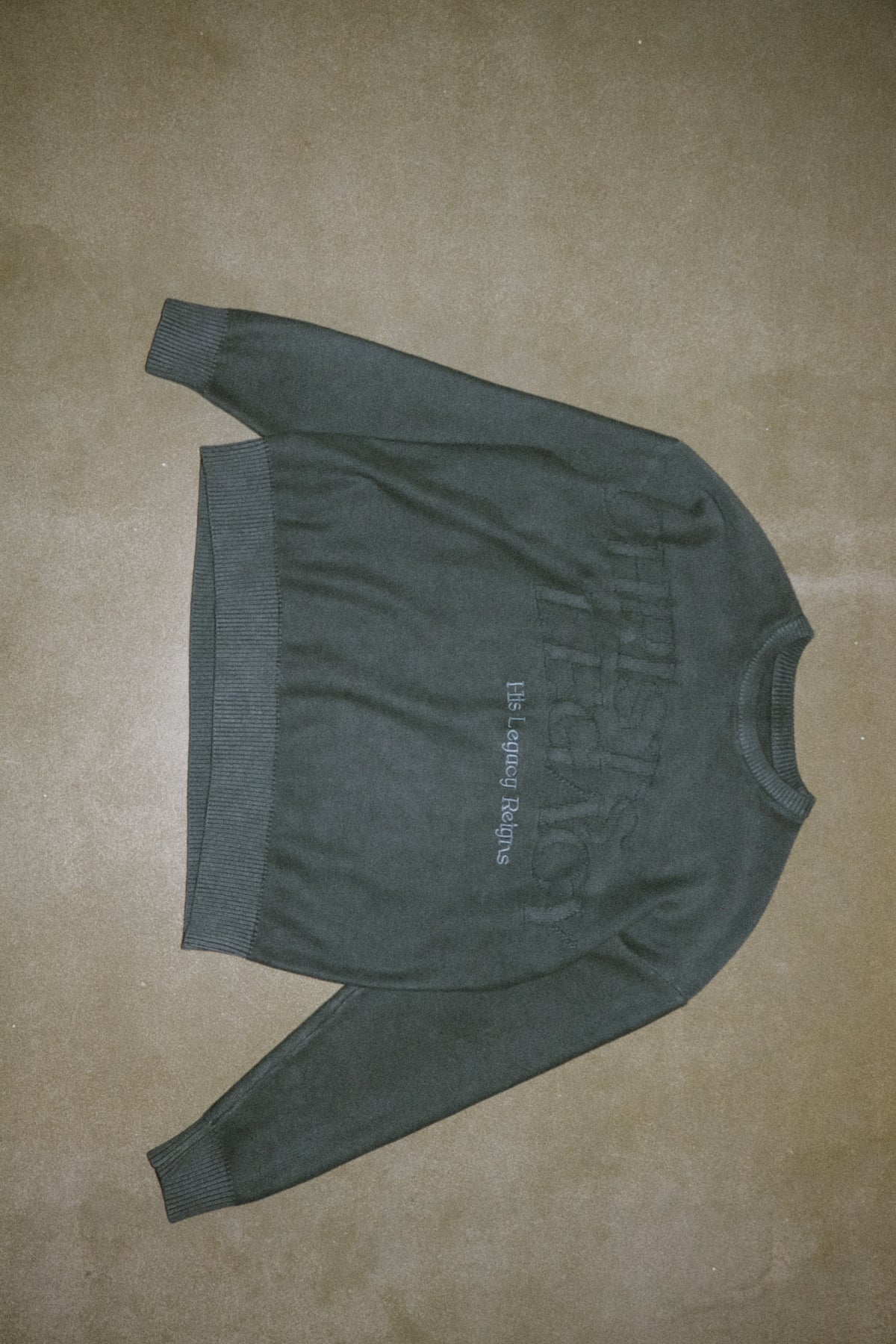 Knitted ‘His Legacy Reigns’ Sweater
